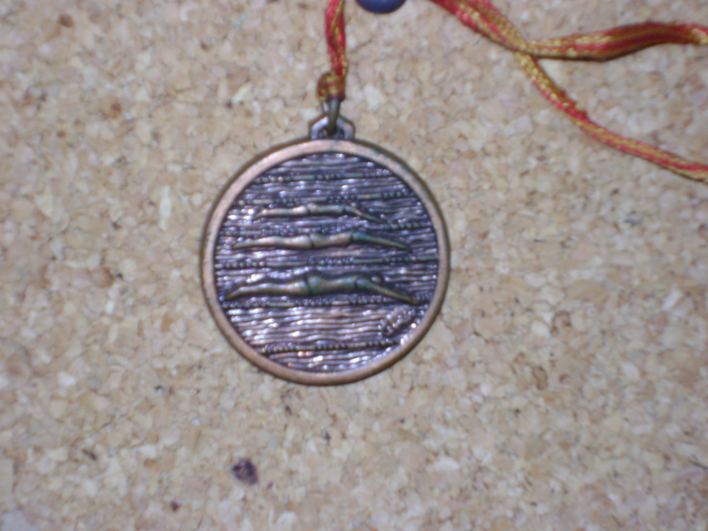 Medalla de natación datada de 1987